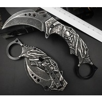 Stonewash Folding Karambit with Skull Design and Pocket Clip